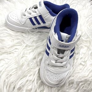 White and blue adidas . Size 6c